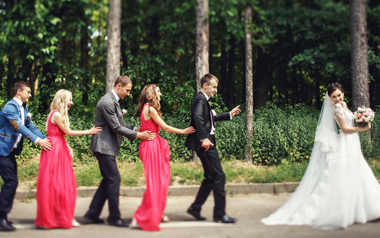 Bride leading a wedding conga line