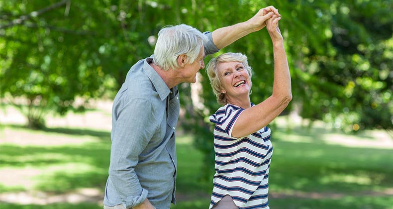 Seniors dancing outside | wavebreakmedia/Shutterstock.com