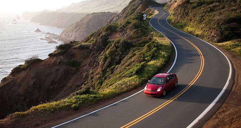 Car driving down zigzag road | Michael Hanson/Getty Images