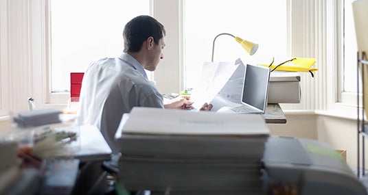 Man sitting in home office © bikeriderlondon/Shutterstock.com