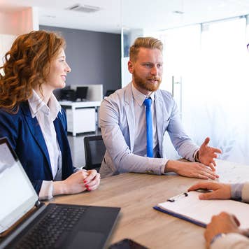 Loan officer and couple meeting