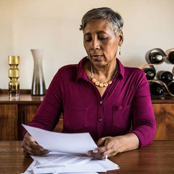 Woman reading paperwork