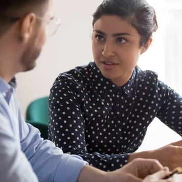 couple sitting at table having a conversation