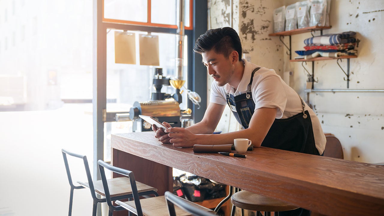 Man using his tablet for online banking