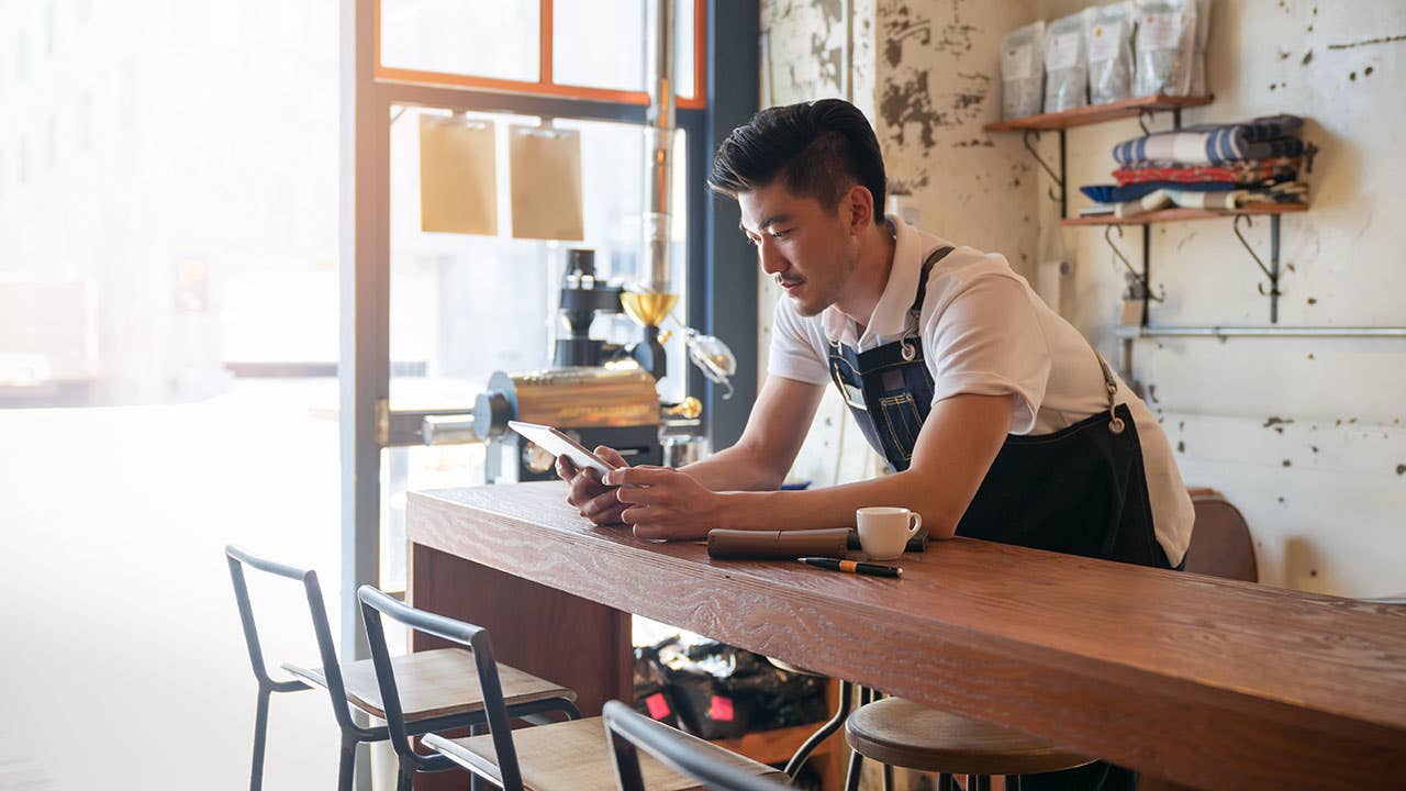 Man using his tablet for online banking