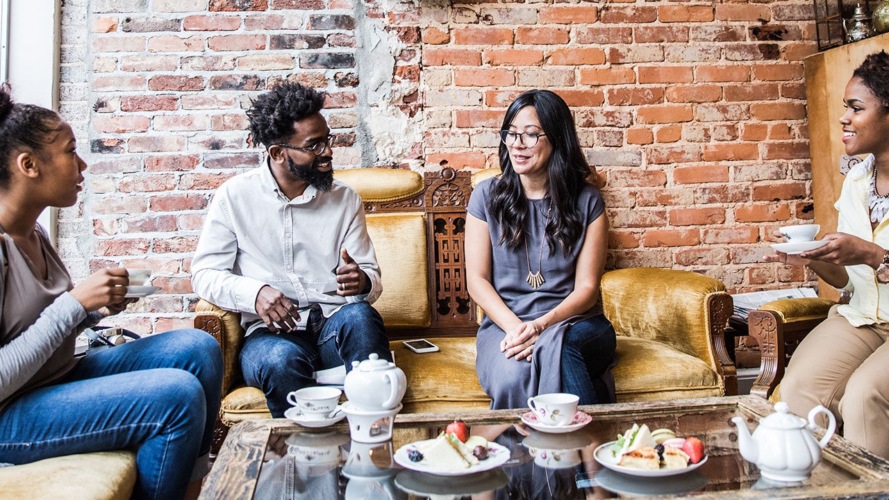 Friends talking over tea