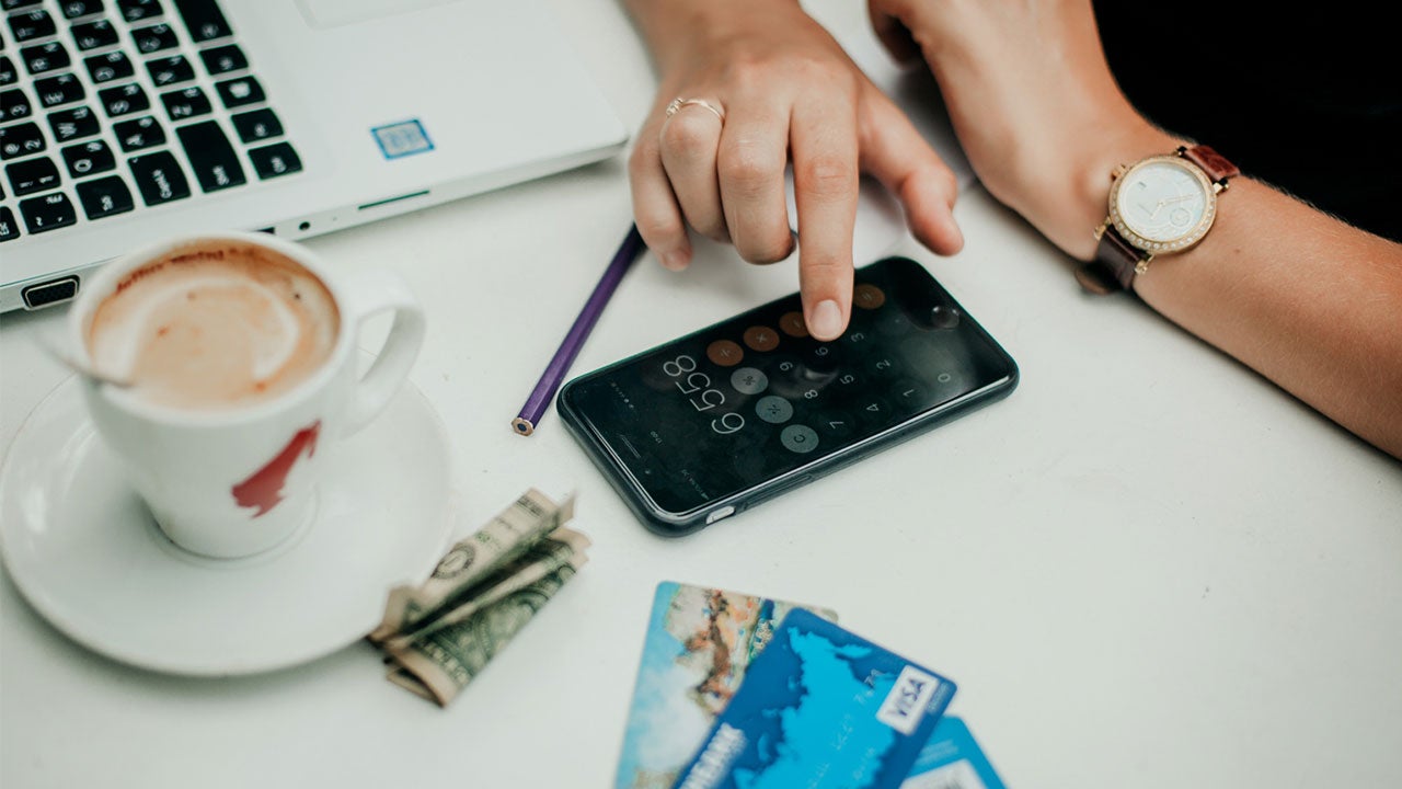 Woman calculating expenses