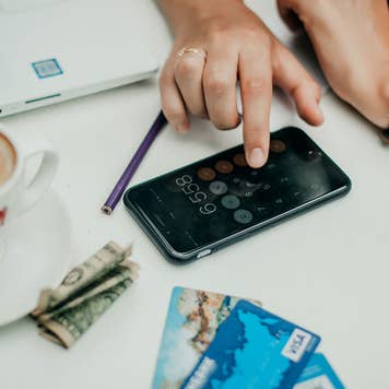 Woman calculating expenses