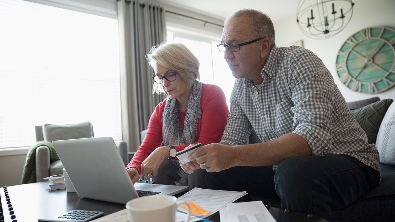 Couple paying credit card bill