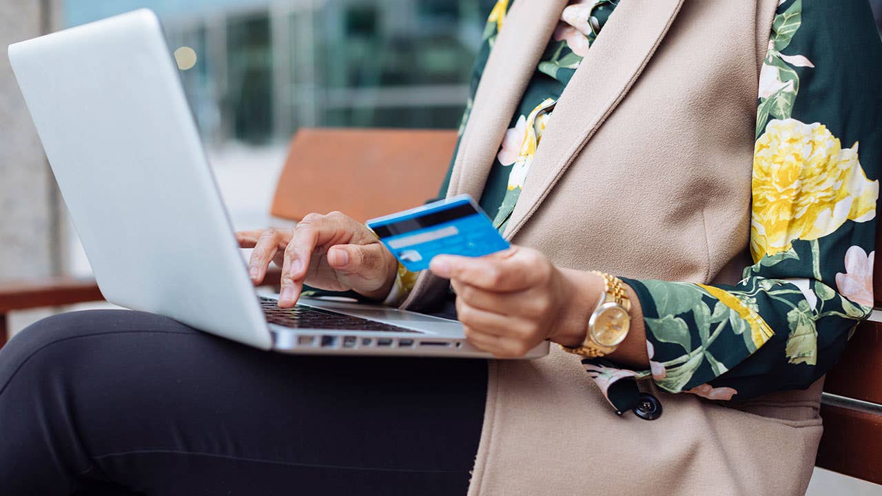 Woman paying credit card online