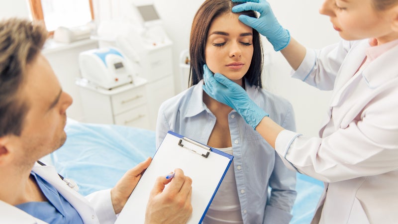 Woman in consultation for plastic surgery 