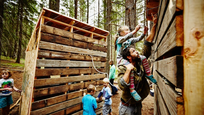 Kids with camp counselor at summer camp
