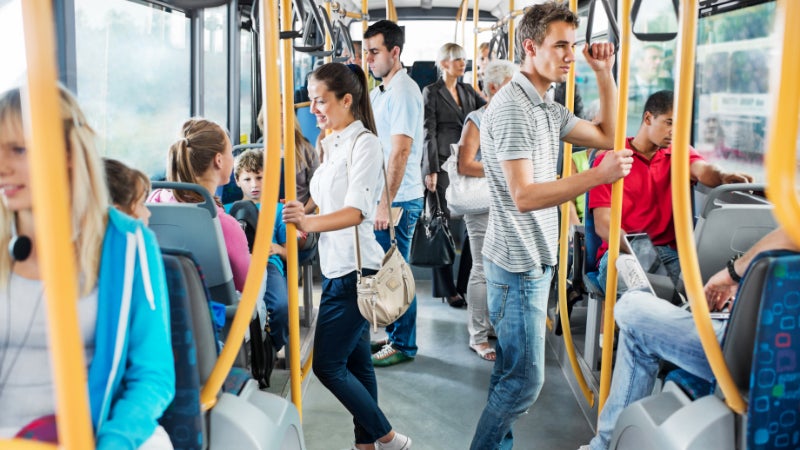 People commuting on bus