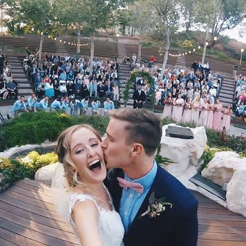Couple doing a selfie at wedding