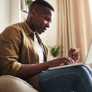 Person paying credit card bill on computer