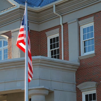 Outside view of a bank with American flag