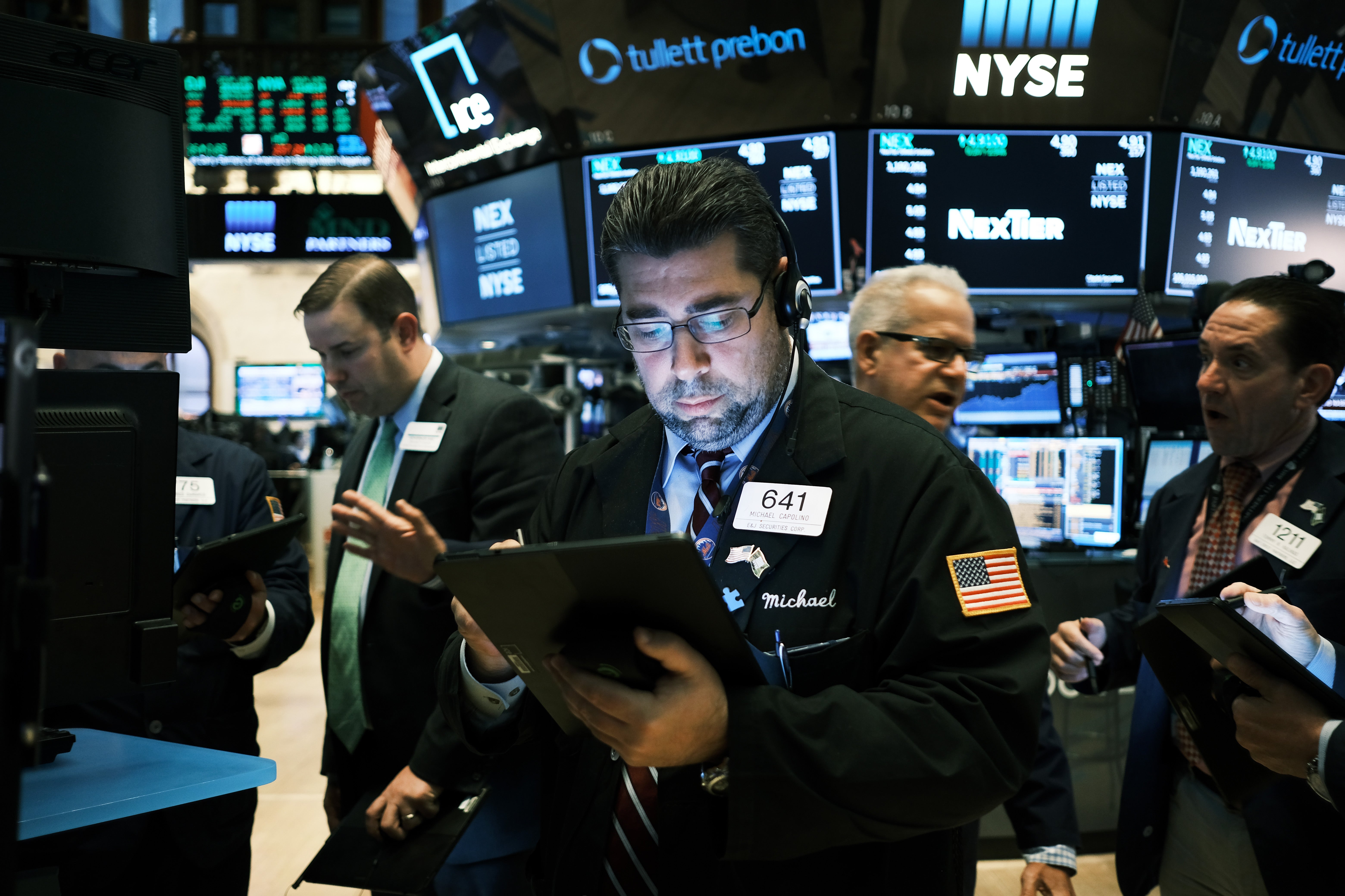 Traders work on the floor of the New York Stock Exchange.