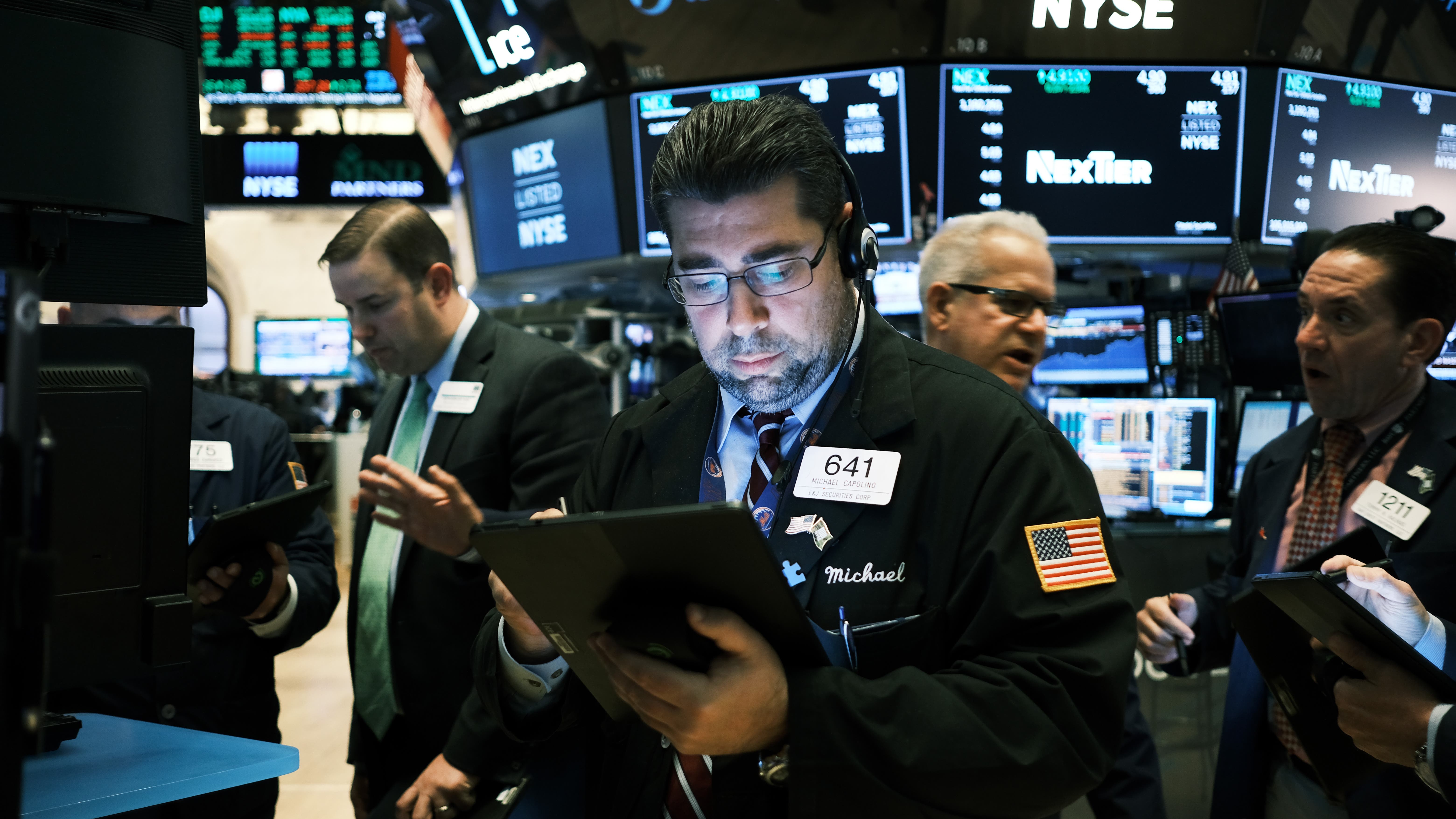 Traders work on the floor of the New York Stock Exchange.