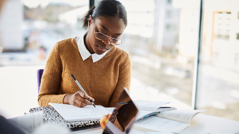 Girl studying at computer