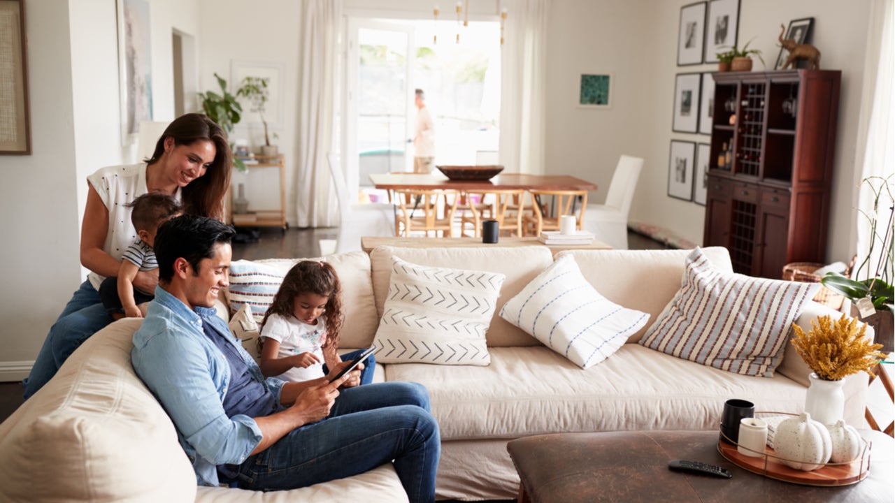 A family hangs out in their living room