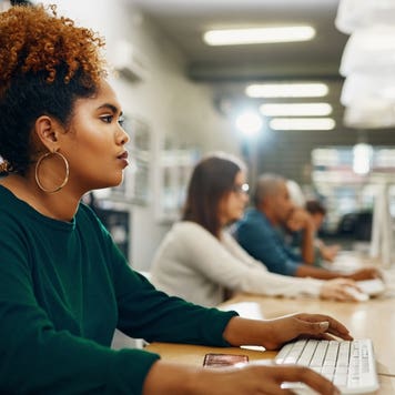 A woman participates in an online class