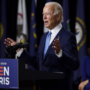 Former Vice President Joe Biden speaks at a press conference in Wilmington, Delaware, beside vice presidential running mate, U.S. Senator Kamala Harris.