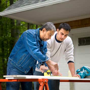 Father, son working together