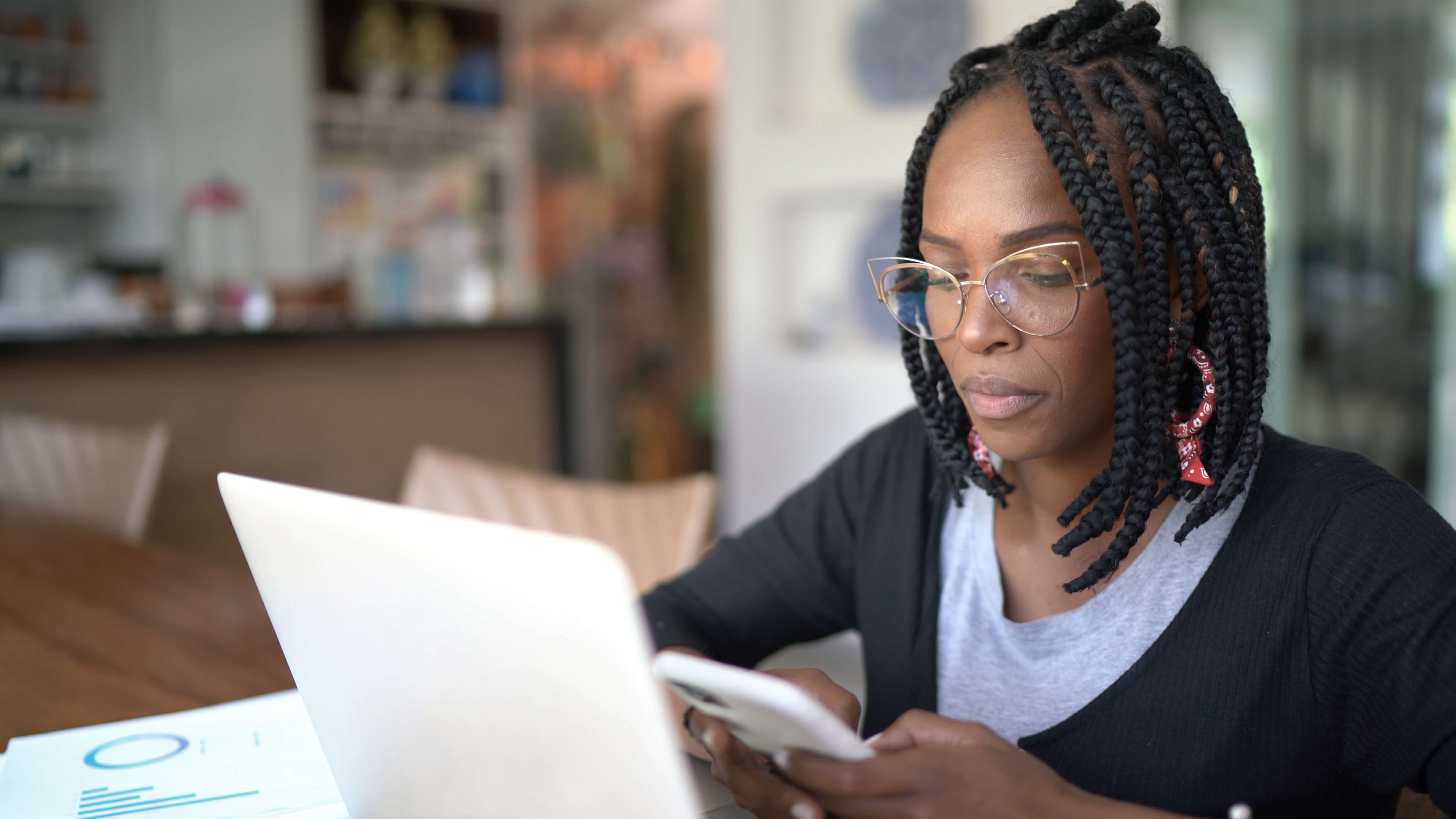 Female customer reviewing card application