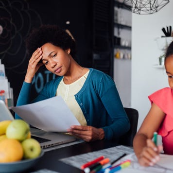 Young mother looking for a job using internet