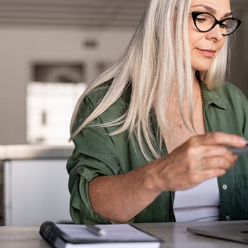 Person looking at credit card