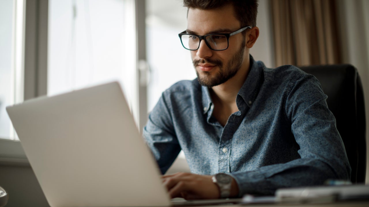 Young man working on laptop