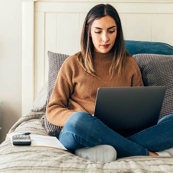 Woman Paying Bills and Banking Online