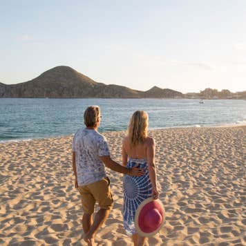 Couple walking on beach