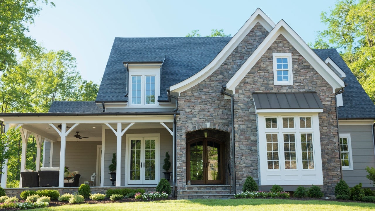 A suburban single-family home with front yard