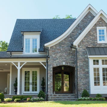 A suburban single-family home with front yard