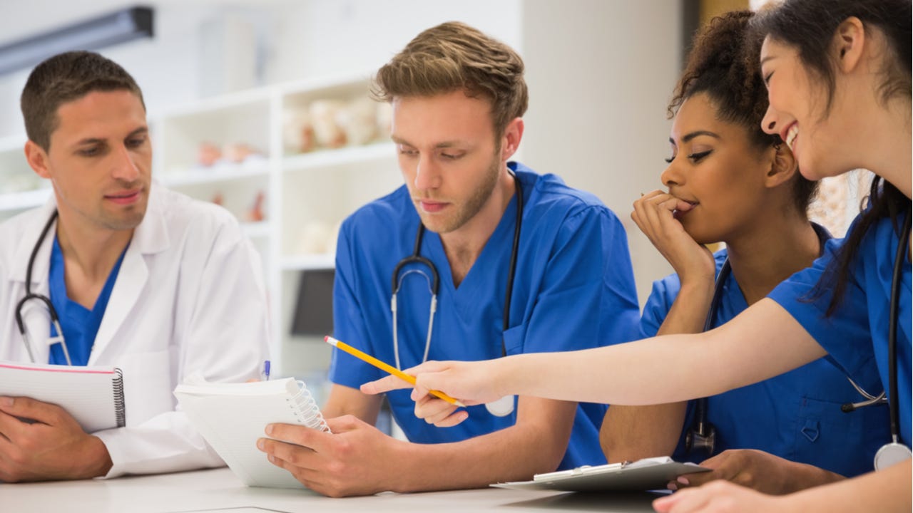 Medical school students discuss schoolwork