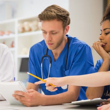 Medical school students discuss schoolwork