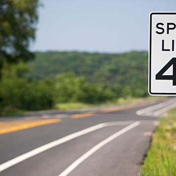 Speed limit sign by the road