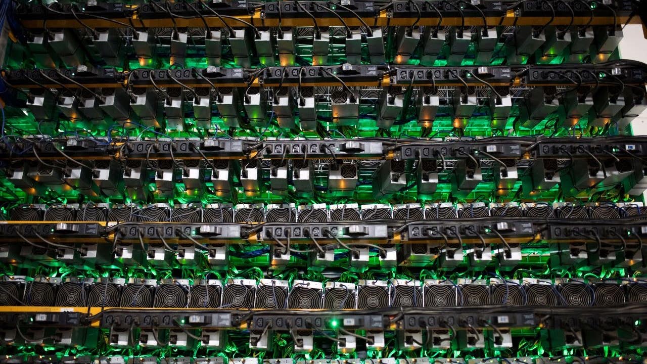 Cryptocurrency mining rigs sit on racks at a facility in Quebec, Canada.