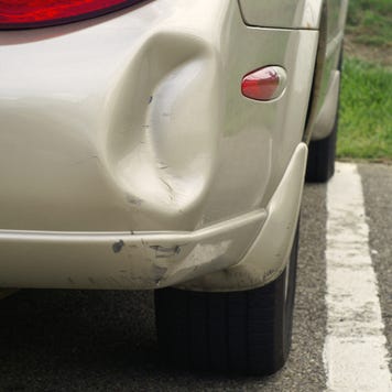 Dented car bumper