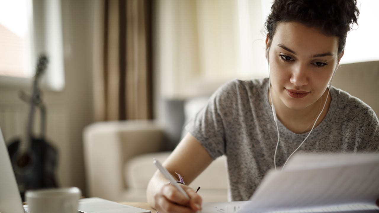 Young woman working at home