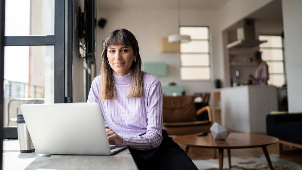 Person looking at laptop screen.