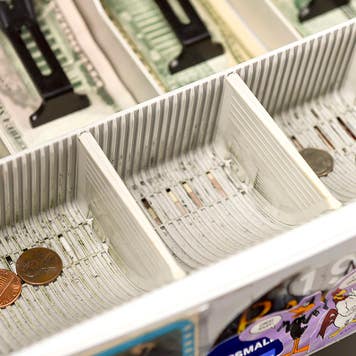 the change drawer of the cash register at Symbiote Collectibles in West Reading, PA
