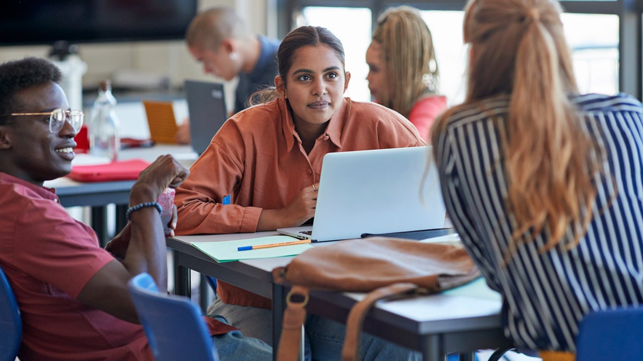 students talking in college