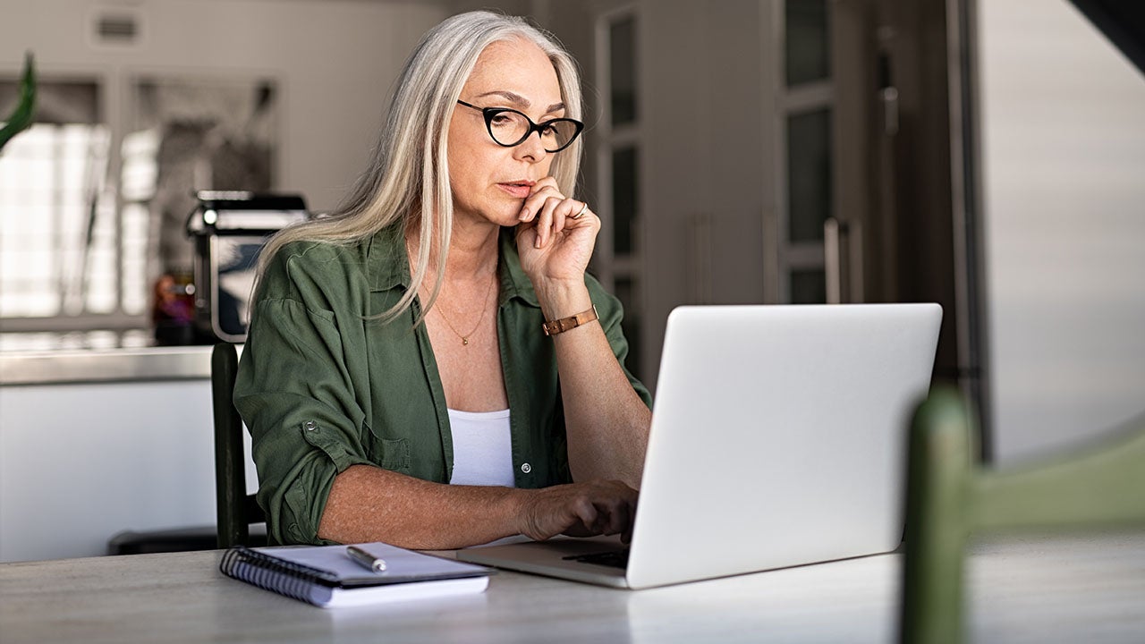 Senior woman working on a laptop