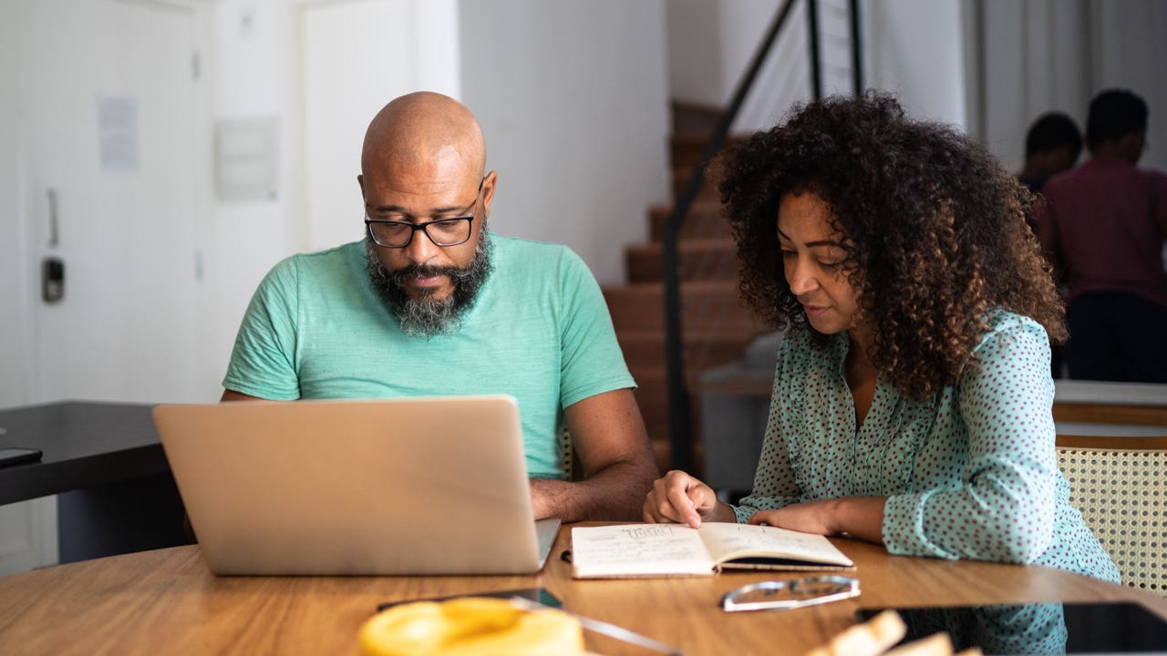 couple working on laptop together