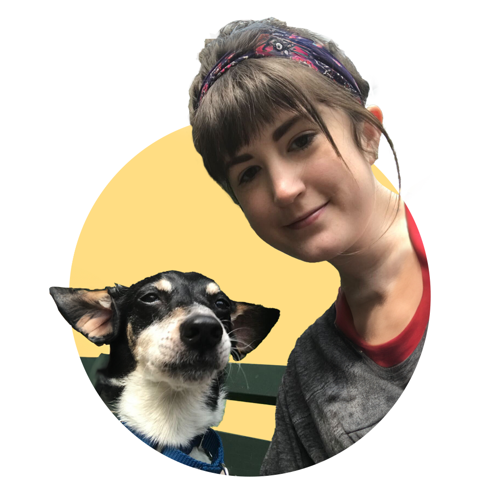 Sarah Foster with her small dog on a bench