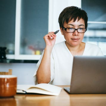 woman working on laptop at home