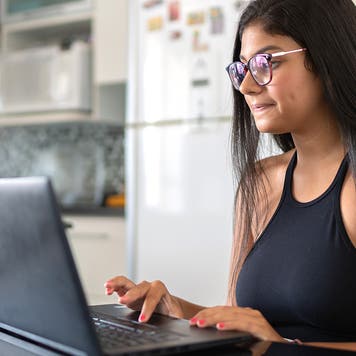 young woman using a laptop