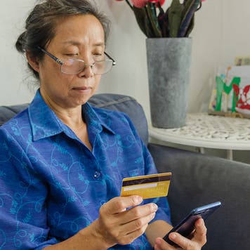 woman looking at card